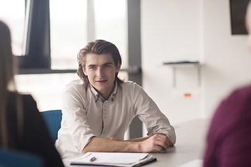 Image showing Group of young people meeting in startup office