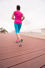 Image showing woman running on the promenade