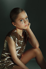 Image showing The fashion portrait of young beautiful teen girl at studio