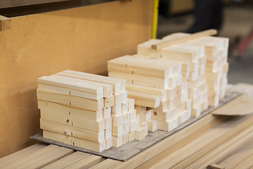 Image showing wooden boards at workshop or woodworking plant