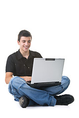 Image showing Young Man Using a Laptop