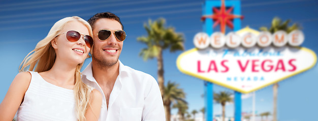 Image showing couple in shades over las vegas sign at summer