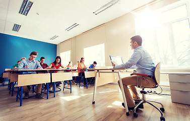 Image showing students and teacher with tablet pc at school