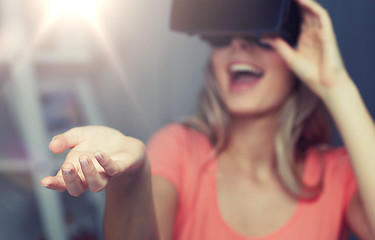 Image showing happy woman in virtual reality headset or glasses