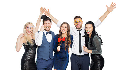 Image showing happy friends with party props posing