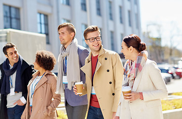 Image showing office workers with coffee on city street