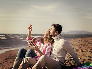 Image showing young couple enjoying time together at beach