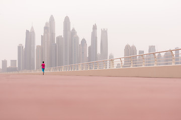 Image showing woman running on the promenade