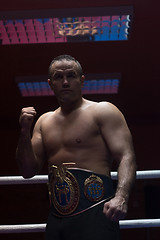 Image showing kick boxer with his championship belt