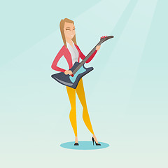 Image showing Woman playing the electric guitar.