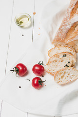 Image showing The fresh bread on a white table background