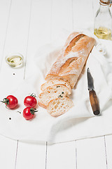 Image showing The fresh bread on a white table background