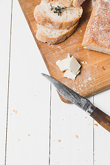 Image showing The fresh bread on a white table background