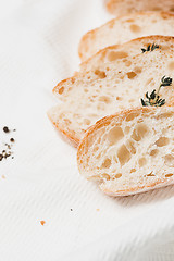 Image showing The fresh bread on a white table background
