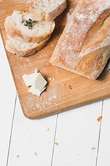 Image showing The fresh bread on a white table background