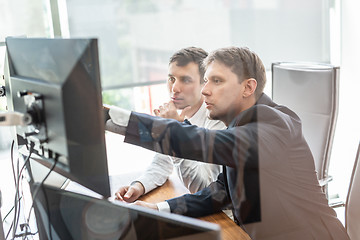 Image showing Business team analyzing data at business meeting.