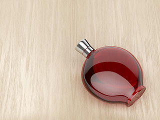 Image showing Liqueur bottle on wood background