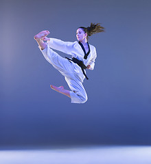 Image showing The karate girl with black belt