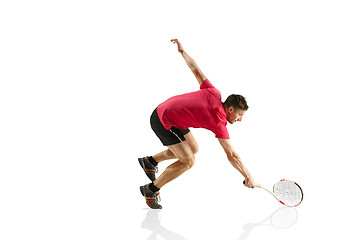 Image showing one caucasian man playing tennis player isolated on white background