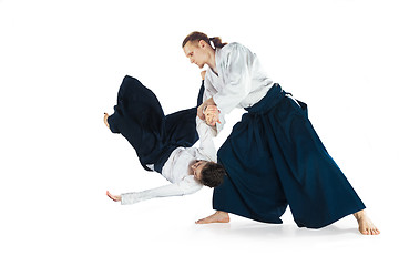 Image showing Man and woman fighting at Aikido training in martial arts school