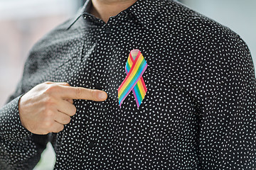 Image showing man with gay pride rainbow awareness ribbon