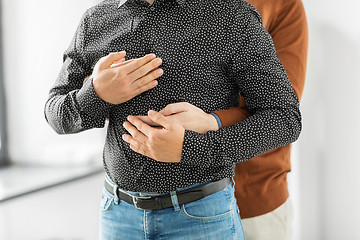 Image showing close up of hugging male gay couple