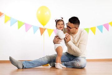 Image showing happy father and little daughter at birthday party