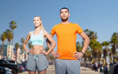 Image showing couple doing sports at summer over venice beach