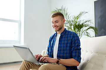 Image showing man with laptop working at office