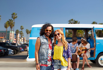 Image showing hippie couple over minivan at venice beach in la