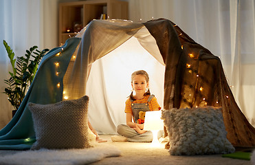 Image showing little girl with toys in kids tent at home