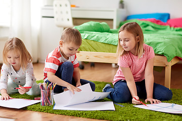 Image showing happy creative kids drawing at home