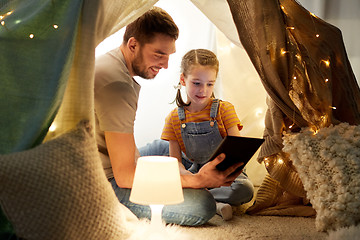 Image showing family with tablet pc in kids tent at home