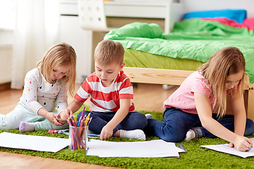 Image showing happy creative kids drawing at home