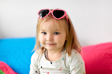 Image showing portrait of smiling little girl with sunglasses