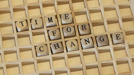 Image showing wooden dice time for change