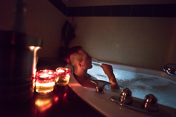 Image showing man relaxing in the jacuzzi