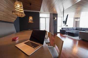 Image showing Notebook with blank screen on table