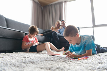 Image showing young couple spending time with kids