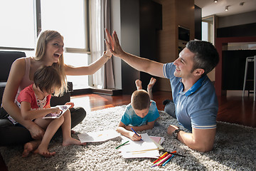 Image showing young couple spending time with kids