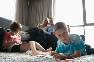 Image showing young couple spending time with kids