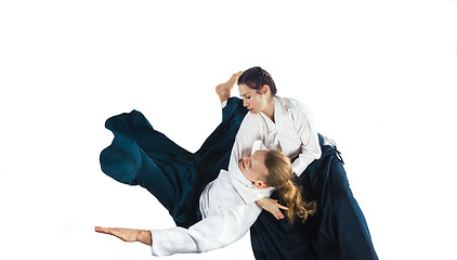 Image showing Man and woman fighting at Aikido training in martial arts school