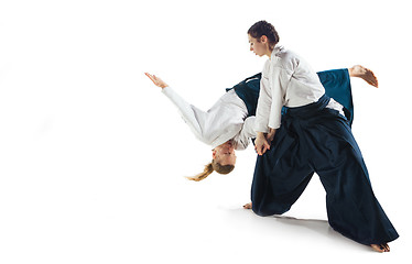 Image showing Man and woman fighting at Aikido training in martial arts school