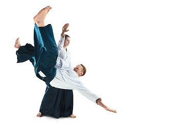 Image showing Man and woman fighting at Aikido training in martial arts school