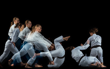 Image showing Man and woman fighting at Aikido training in martial arts school