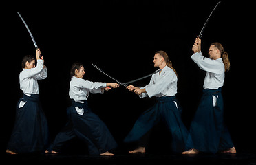 Image showing Man and woman fighting at Aikido training in martial arts school