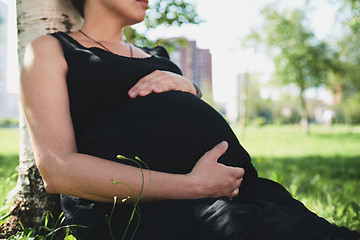 Image showing Pregnant woman in black dress