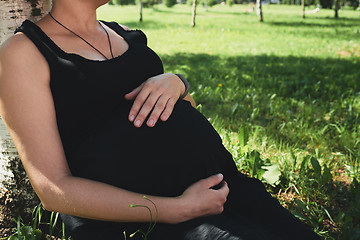 Image showing Pregnant woman in black dress