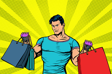 Image showing strong muscular man with bags on sale