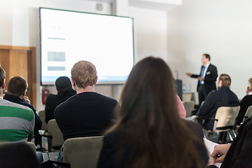 Image showing Business speaker giving a talk at business conference event.